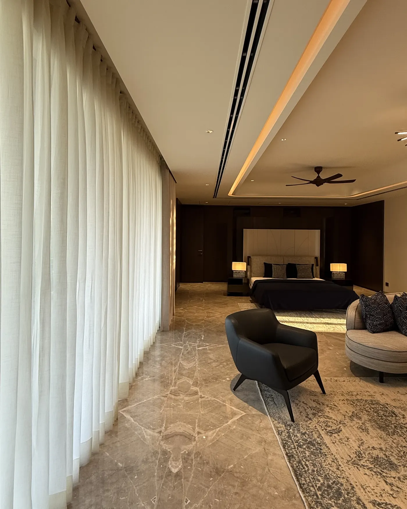 Daylight through sheer curtains in a premium builder floor in Gurgaon