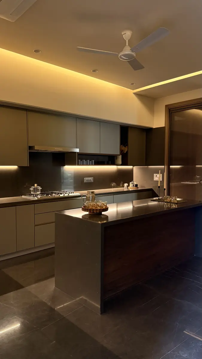 Kitchen with an island and full-height units in a luxury builder floor in Gurgaon