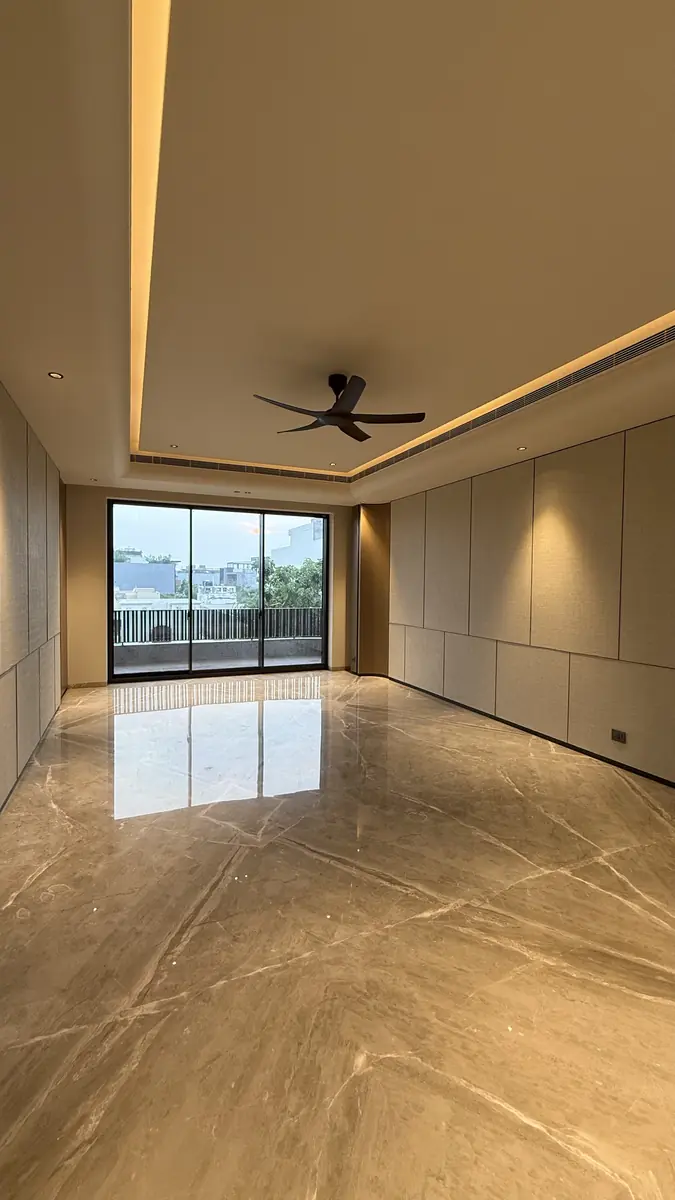 Reception room opening to a balcony in a premium builder floor in Gurgaon