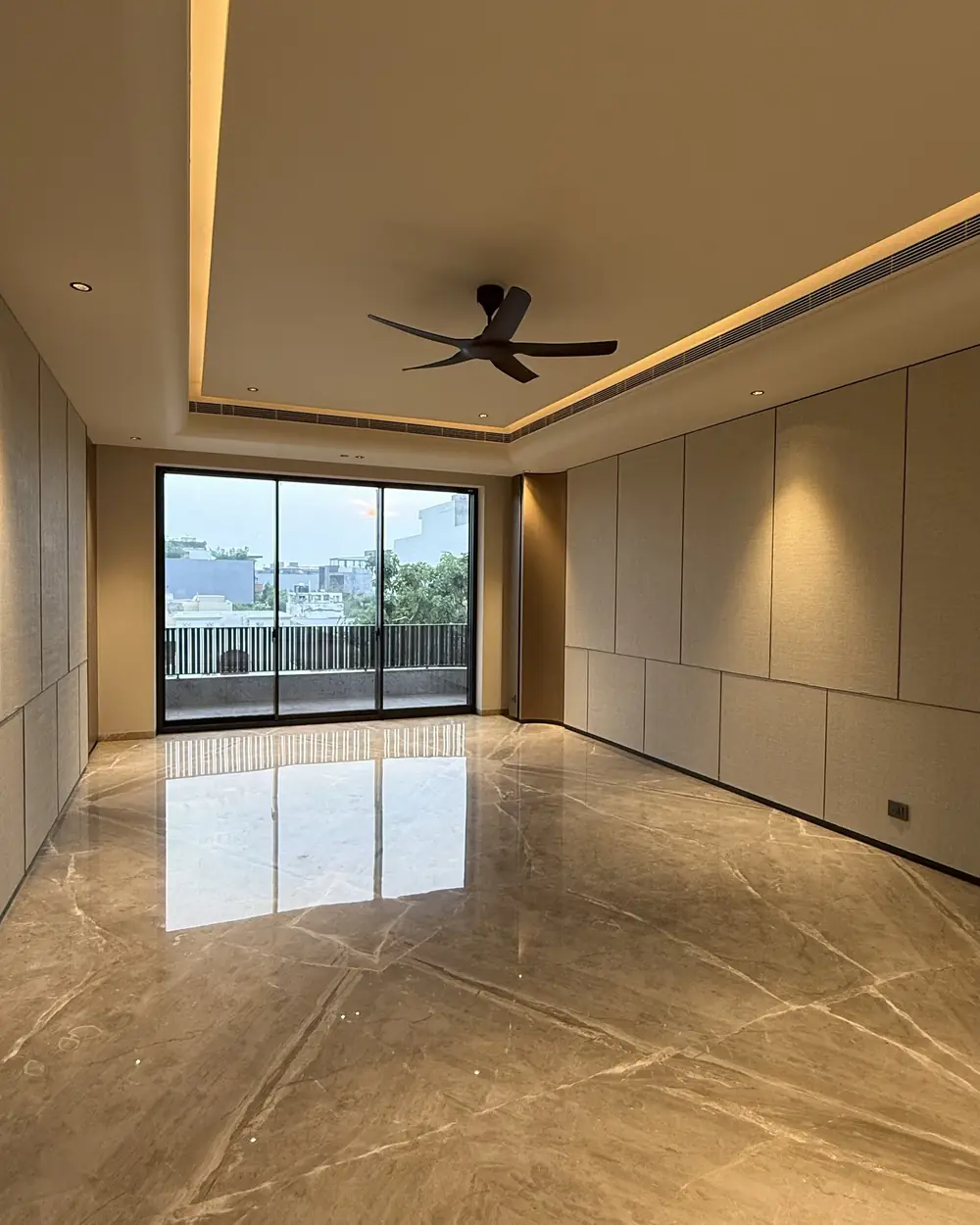 Reception room opening to a balcony in a premium builder floor in Gurgaon