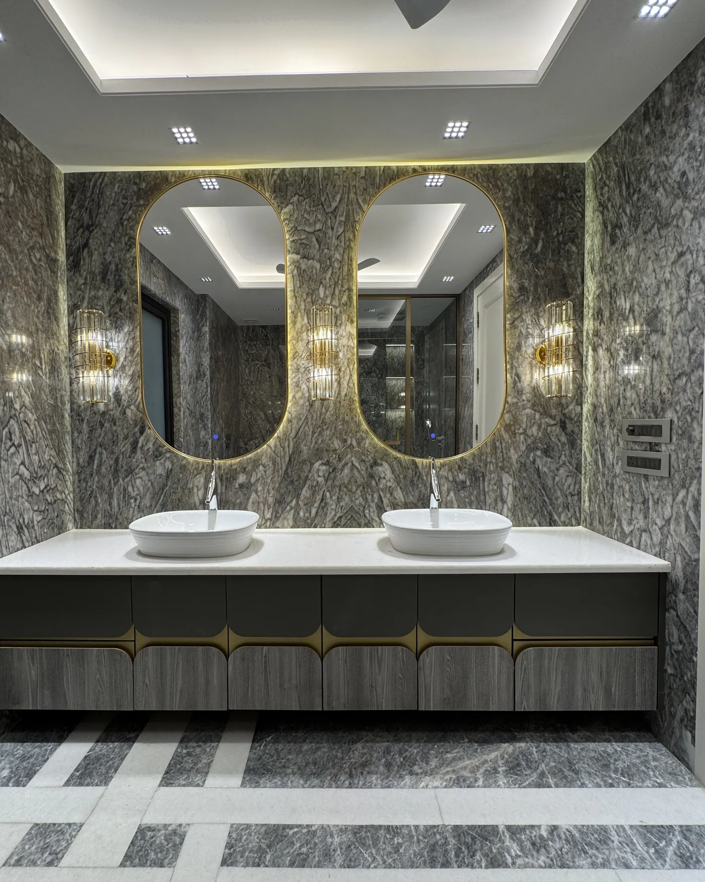 Luxury bathroom with twin marble vanities in a Gurgaon builder floor